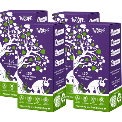 Four purple WOOPF™ boxes of 150 recycled plastic poo bags.