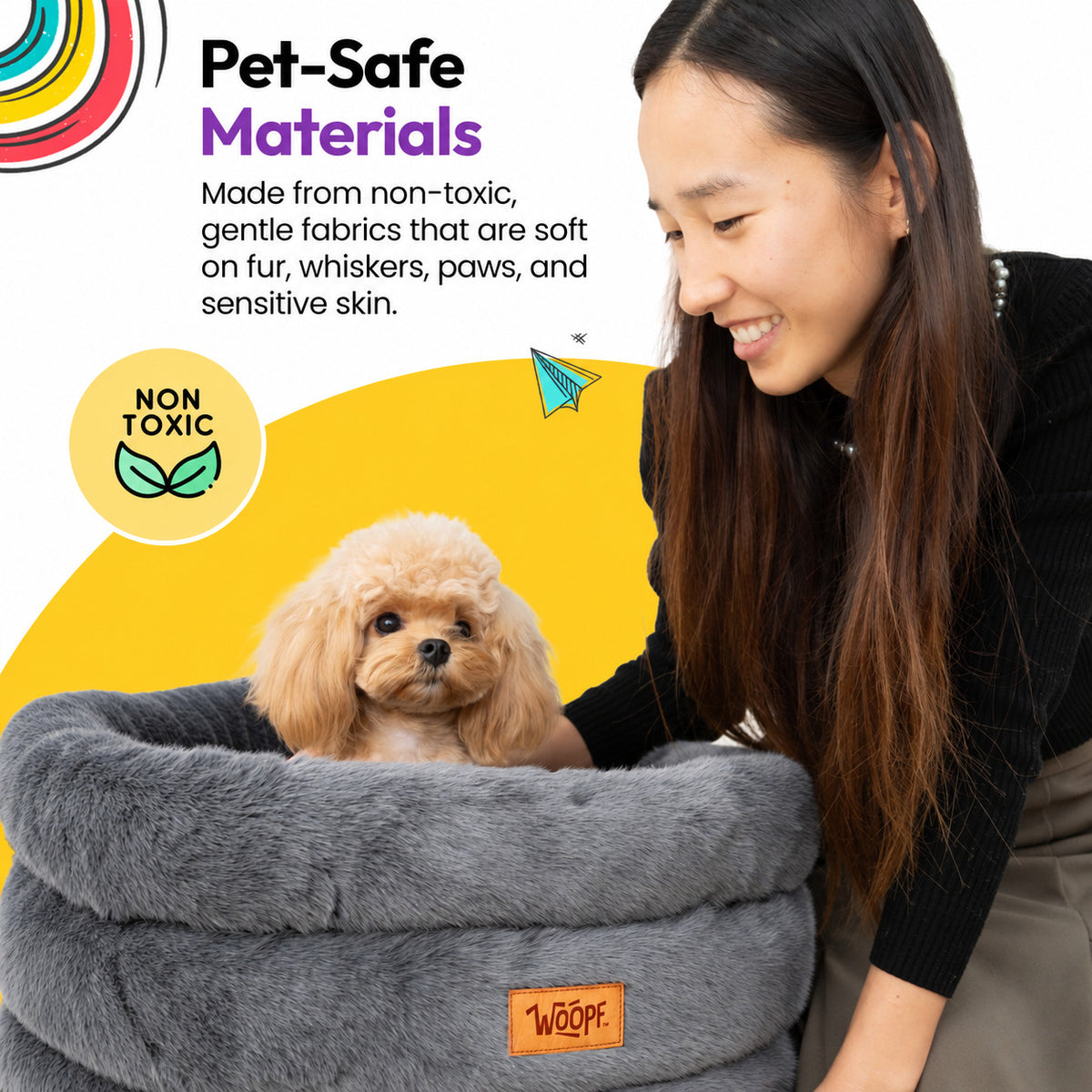 Grey | Furry Range Round Bed: Woman smiling at a poodle sitting in the Grey bed, on a yellow graphic card