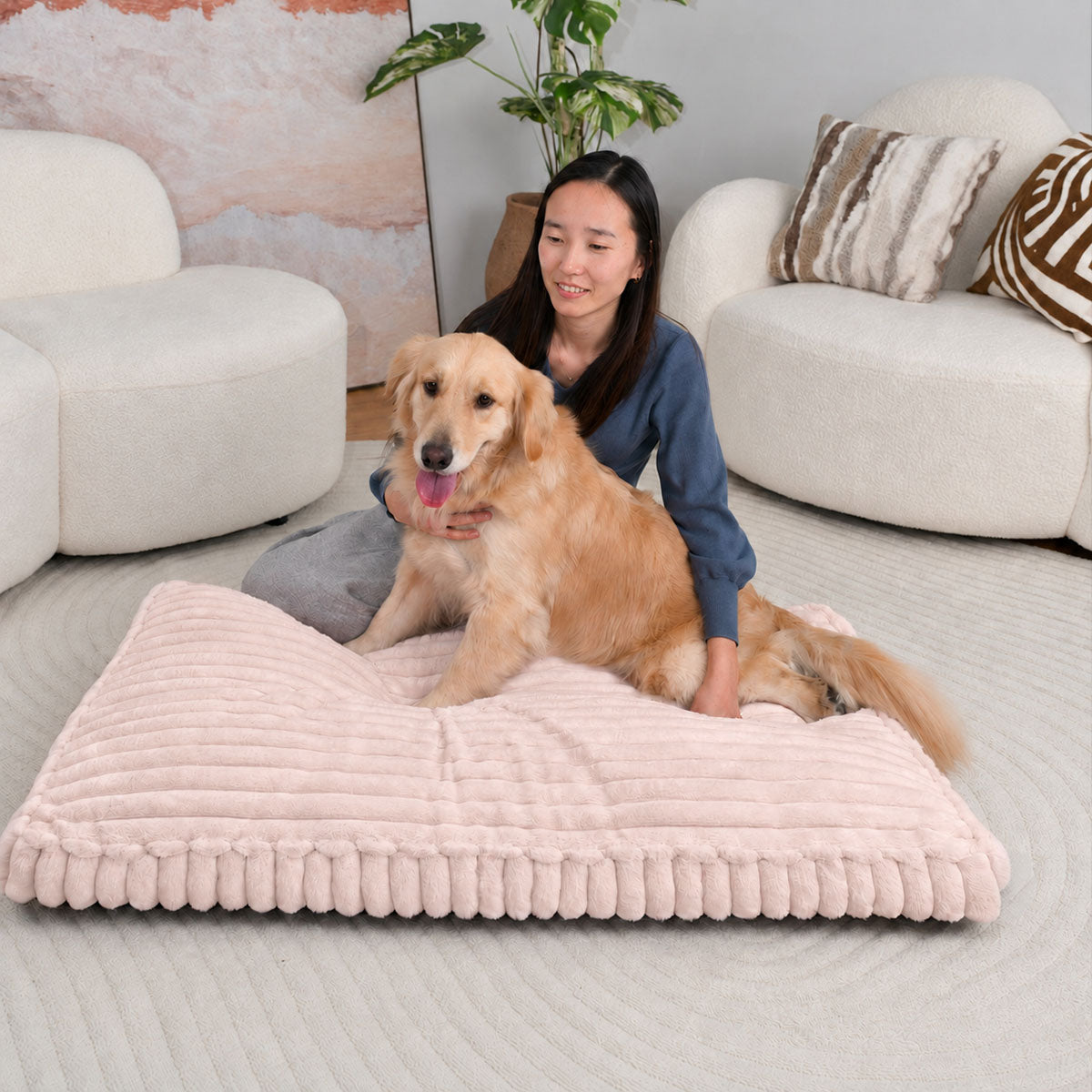 Pale pink | Furry Corduroy Sleeping Mat: Woman kneeling behind a golden retriever sitting up on the Pale pink mat