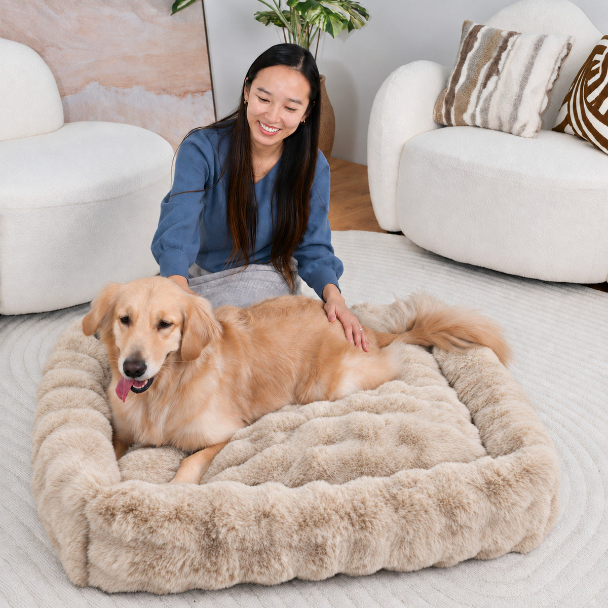 Cream | Furry Curves Rectangle Bed: Woman kneeling beside a golden retriever in the Cream bed