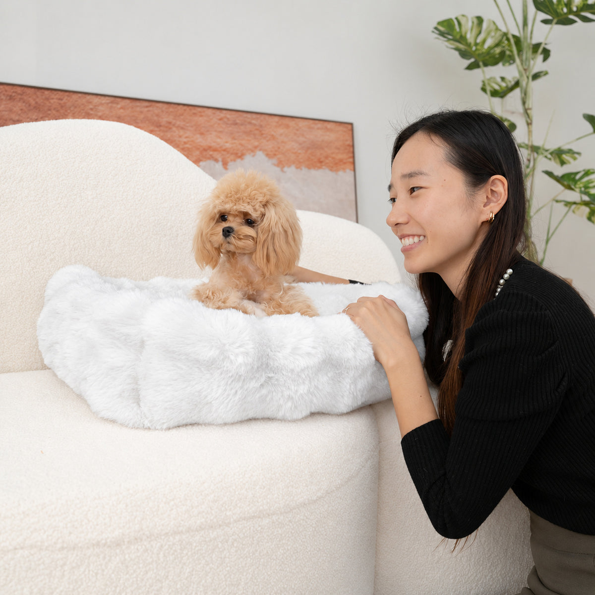 White | Furry Curves Rectangle Bed: Woman smiling at a toy poodle in the White bed