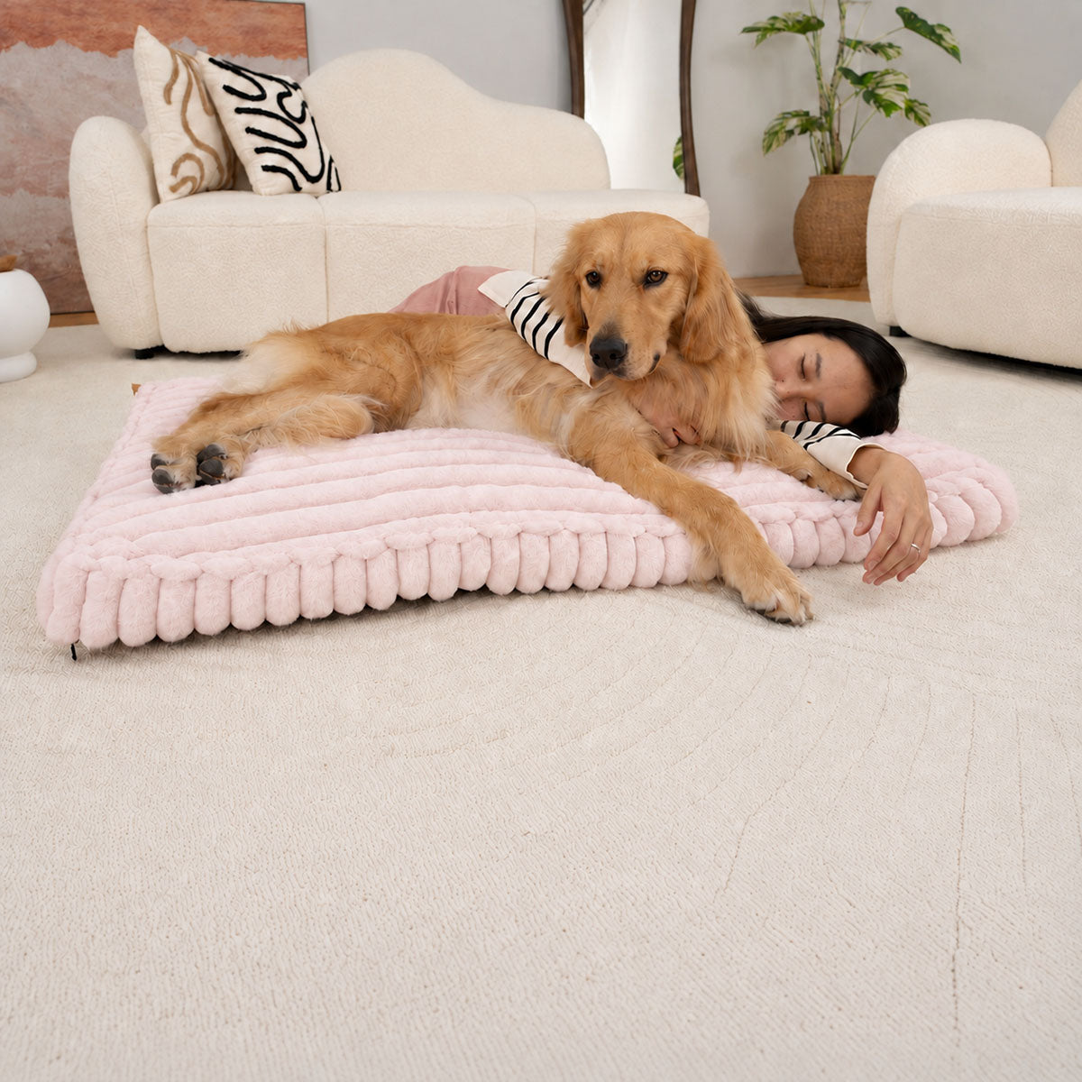 Pale pink | Furry Corduroy Sleeping Mat: Woman lying beside a golden retriever on the Pale pink mat