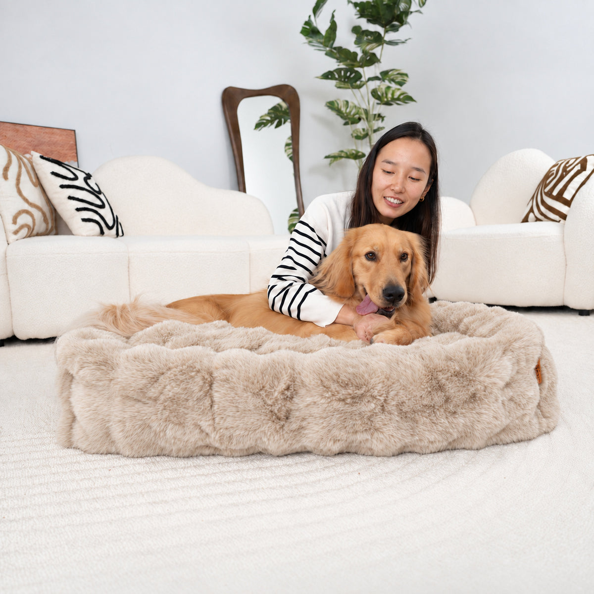 Cream | Furry Curves Rectangle Bed: Woman with two dachshunds in the Cream bed