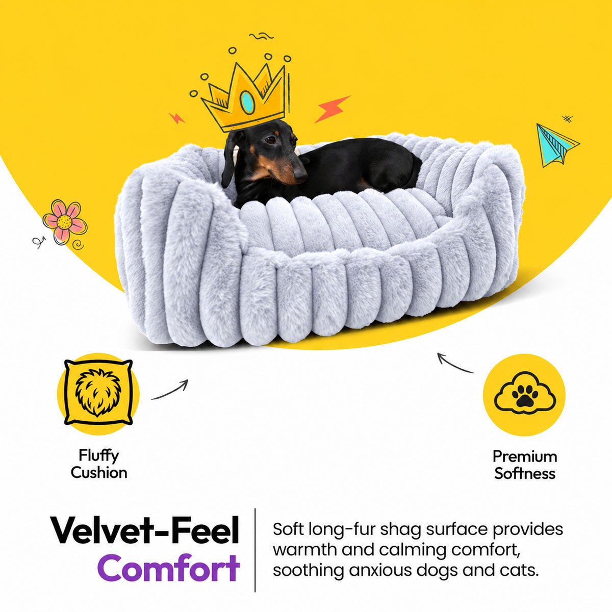Grey | Furry Corduroy Open Front Rectangle Bed: Dachshund in a paper crown lying in the Grey bed on a yellow graphic card