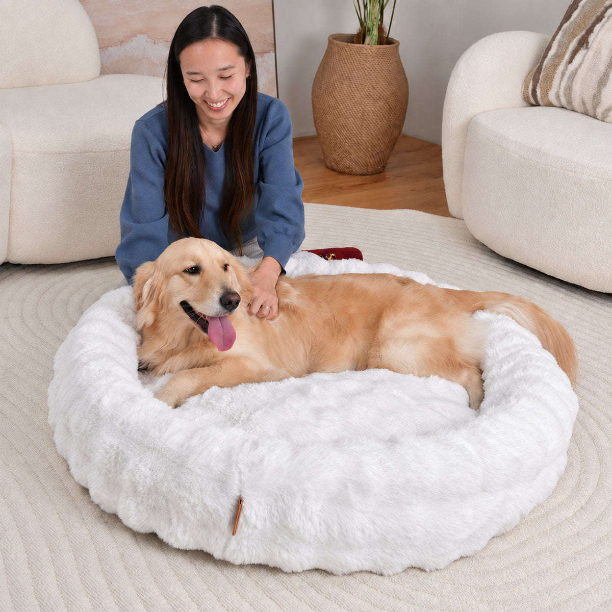 White | Furry Curves Round Bed: A woman with a happy golden retriever in the White round bed