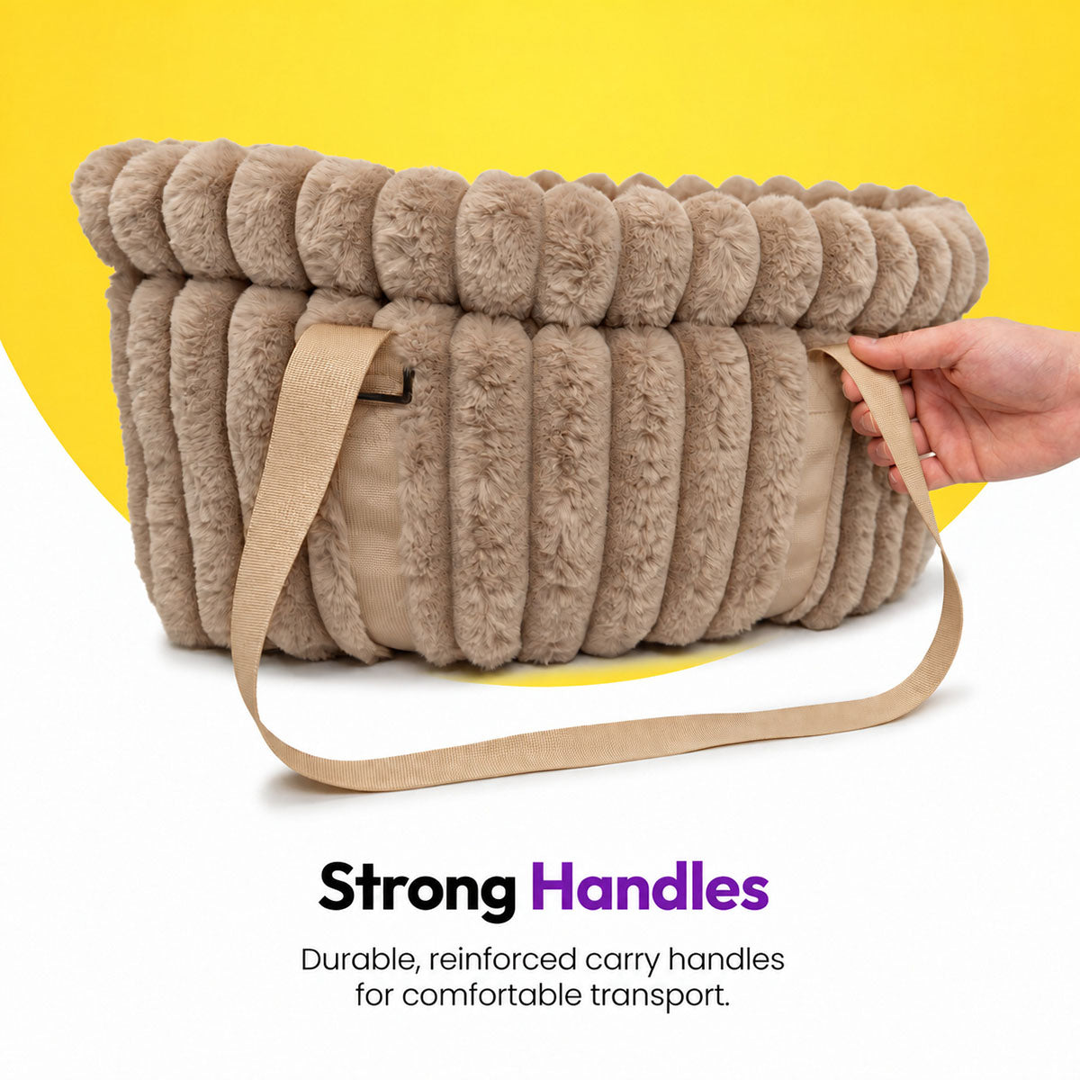 Brown | Corduroy Calming Dog Carrier: Hand lifting the Brown carrier by its handle, headed Strong Handles
