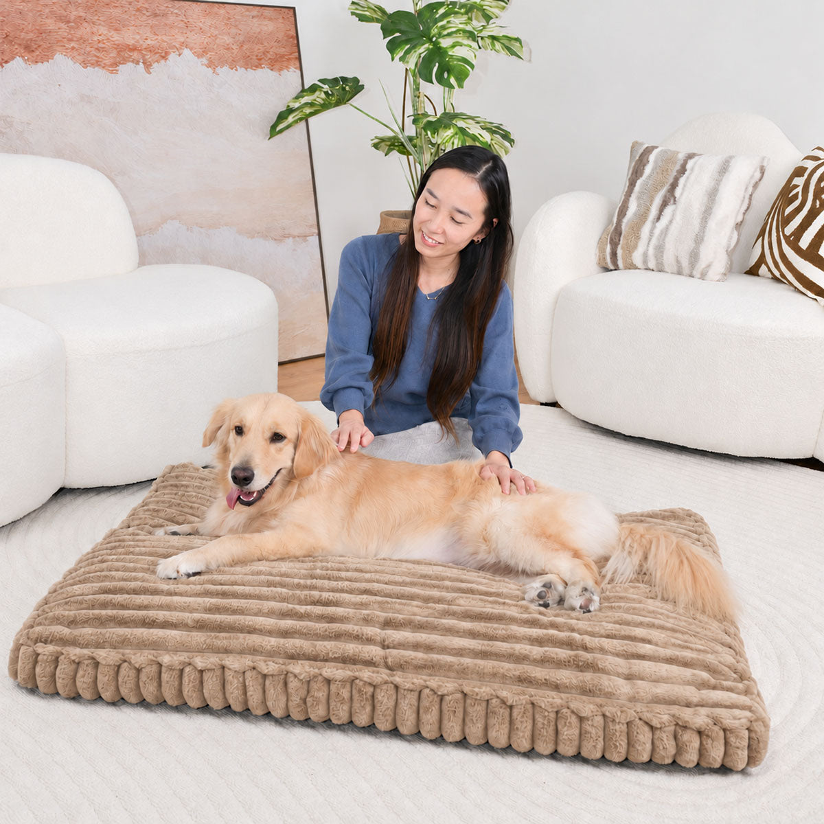 Brown | Furry Corduroy Sleeping Mat: Woman stroking a golden retriever stretched out on the Brown mat