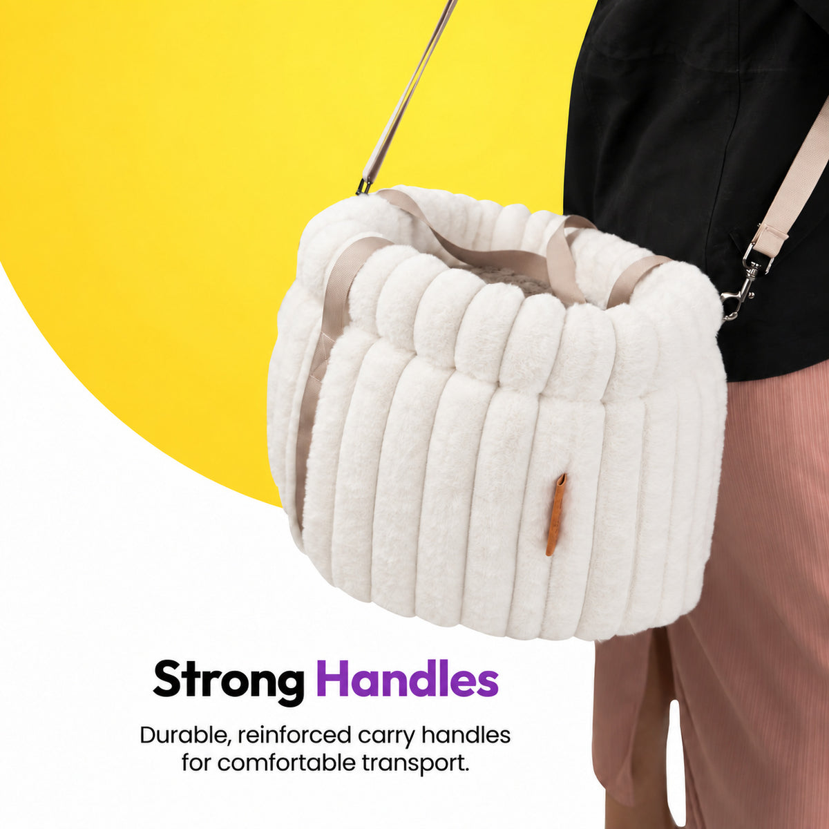 White | Corduroy Calming Dog Carrier: The White carrier on a woman's shoulder, headed Strong Handles