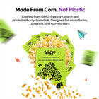All | Poop & Go 100% Compostable Bags: Green bags among popcorn and corn kernels, headed Made From Corn, Not Plastic