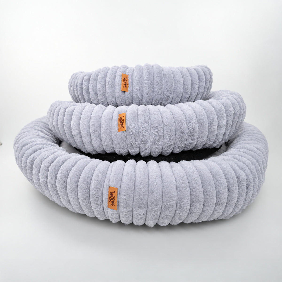 Grey | Furry Corduroy Round Bed: Three Grey beds stacked from Large to Small