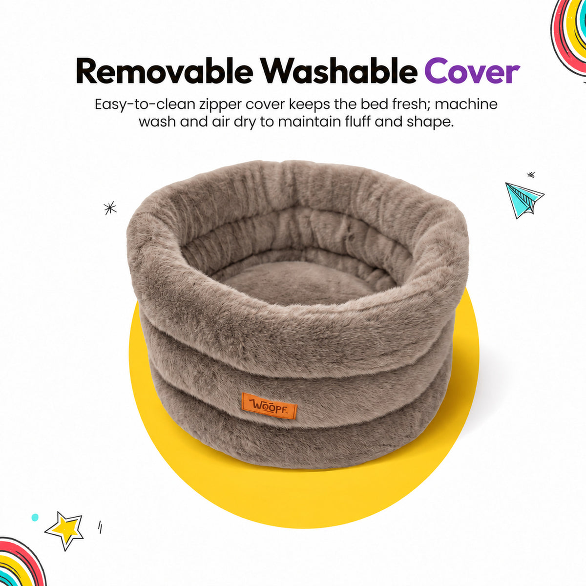 Brown | Furry Range Round Bed: The Brown bed on its own on a yellow graphic card, headed Removable Washable Cover