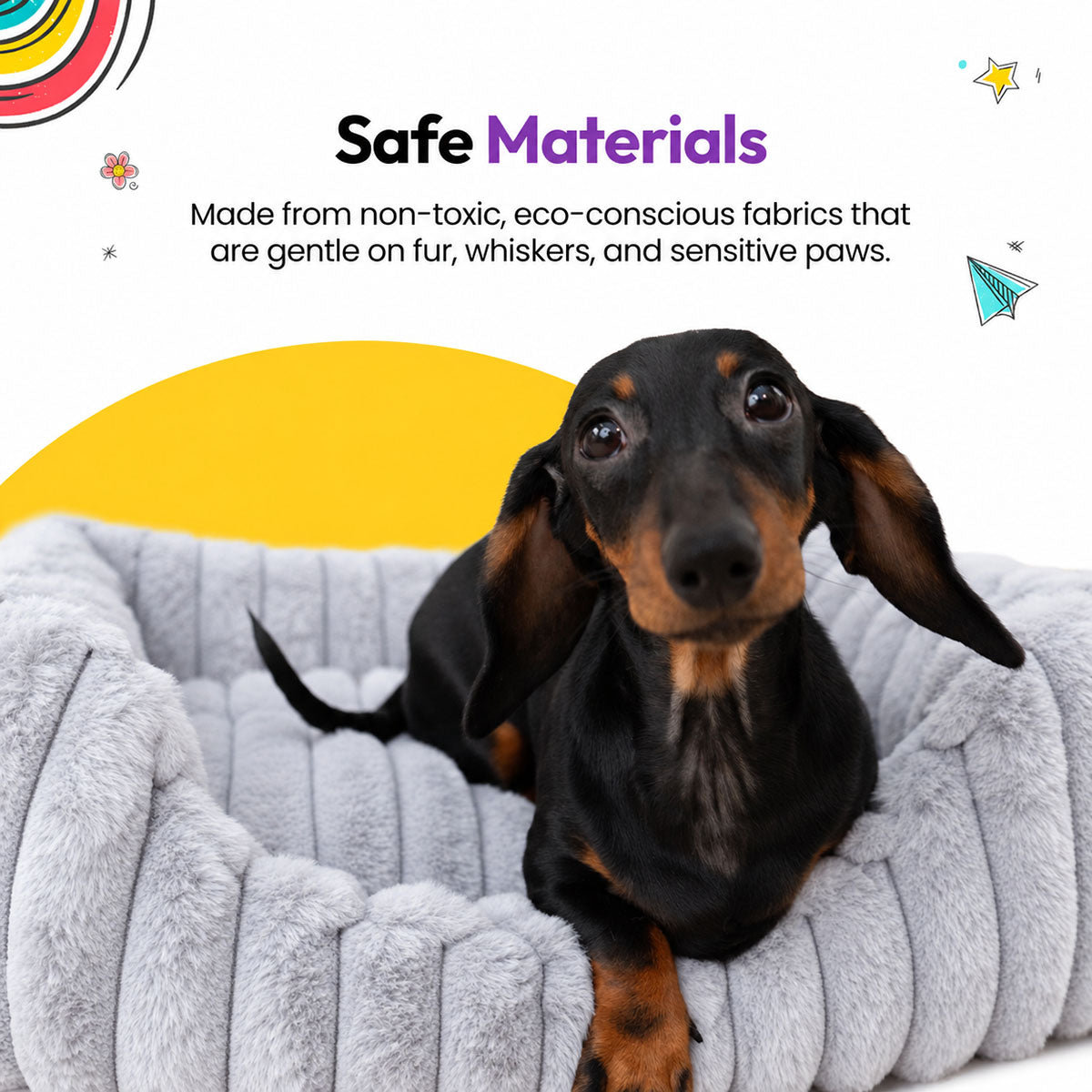 Grey | Furry Corduroy Open Front Rectangle Bed: Close-up of a dachshund lying in the Grey bed on a yellow graphic card