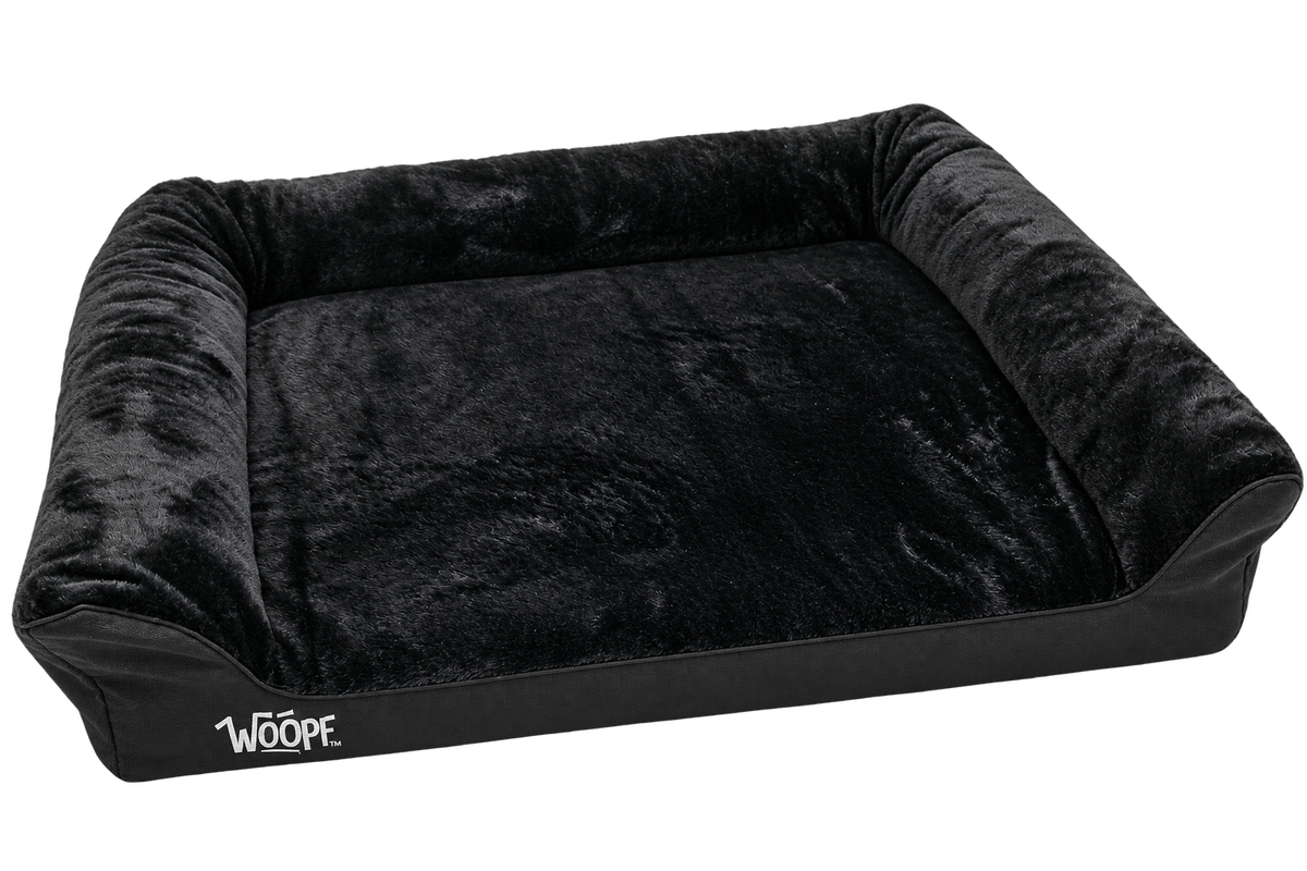 Black | SNÖR Orthopedic Bed: Render of the Small Black bed, angled view showing the plush lining and raised bolsters