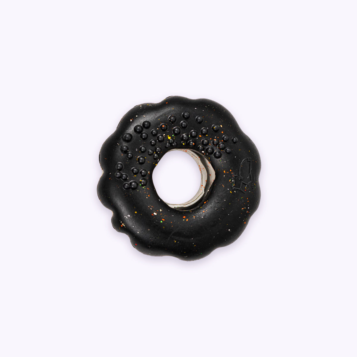 Black | Chewster Donut: The Black ring, Hard strength, on its own on a pale lavender background