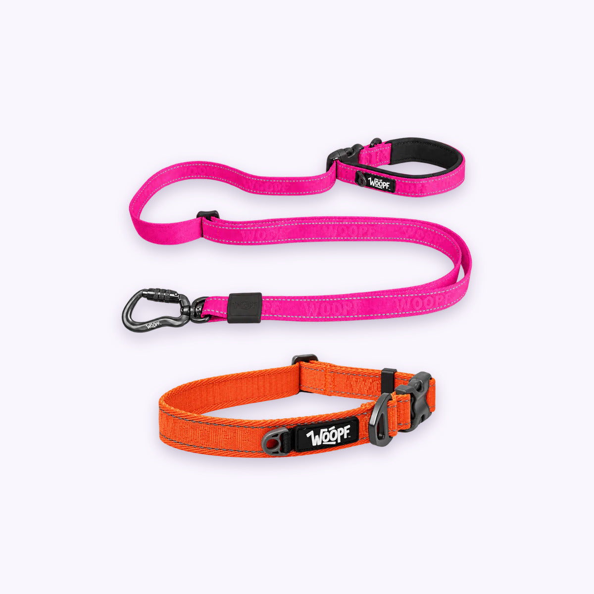 Orange | City Bundle: The Orange Explorer Collar with the Pink Explorer Adjustable Leash on a pale lavender background