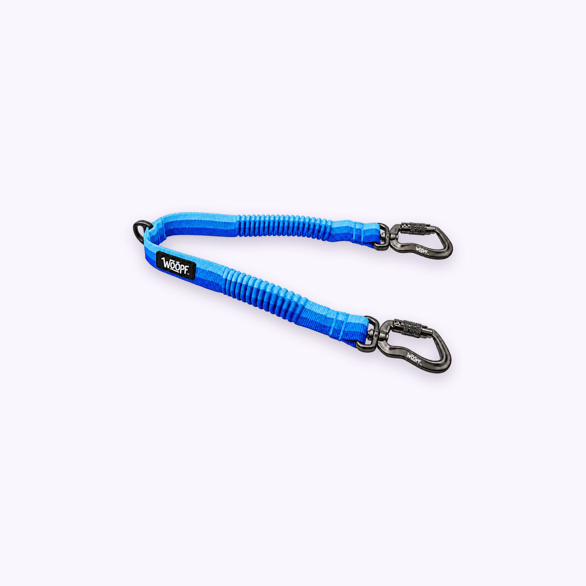 Blue | Explorer Two Dog Walker Leash Attachment: The Blue coupler on its own on a pale lavender background