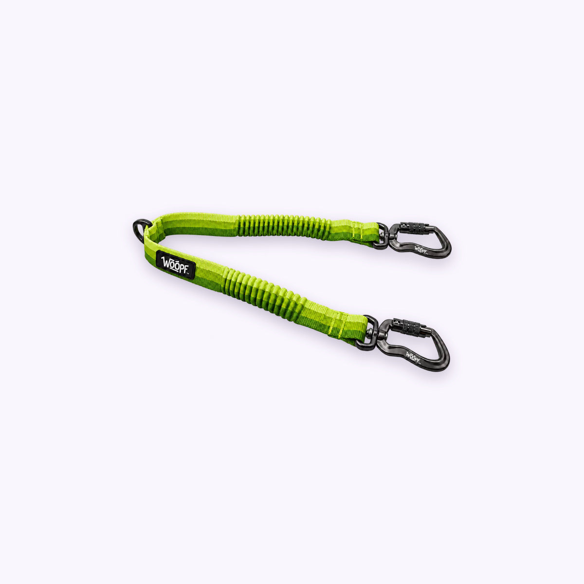 Explorer Two Dog Walker Leash Attachment: The Green coupler on its own on a pale lavender background