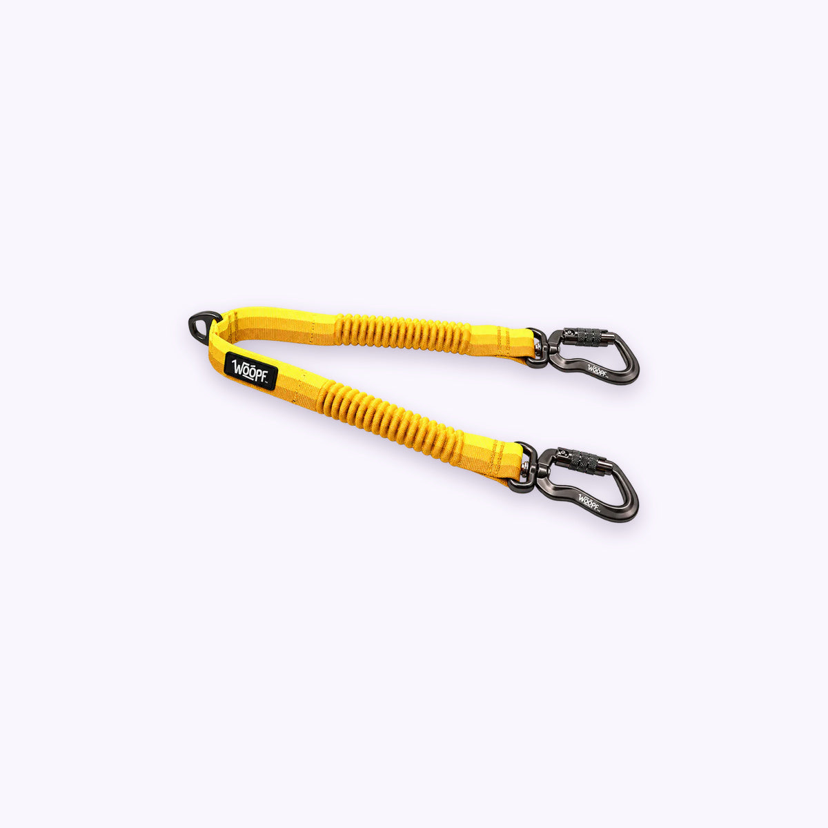 Yellow | Explorer Two Dog Walker Leash Attachment: The Yellow coupler on its own on a pale lavender background