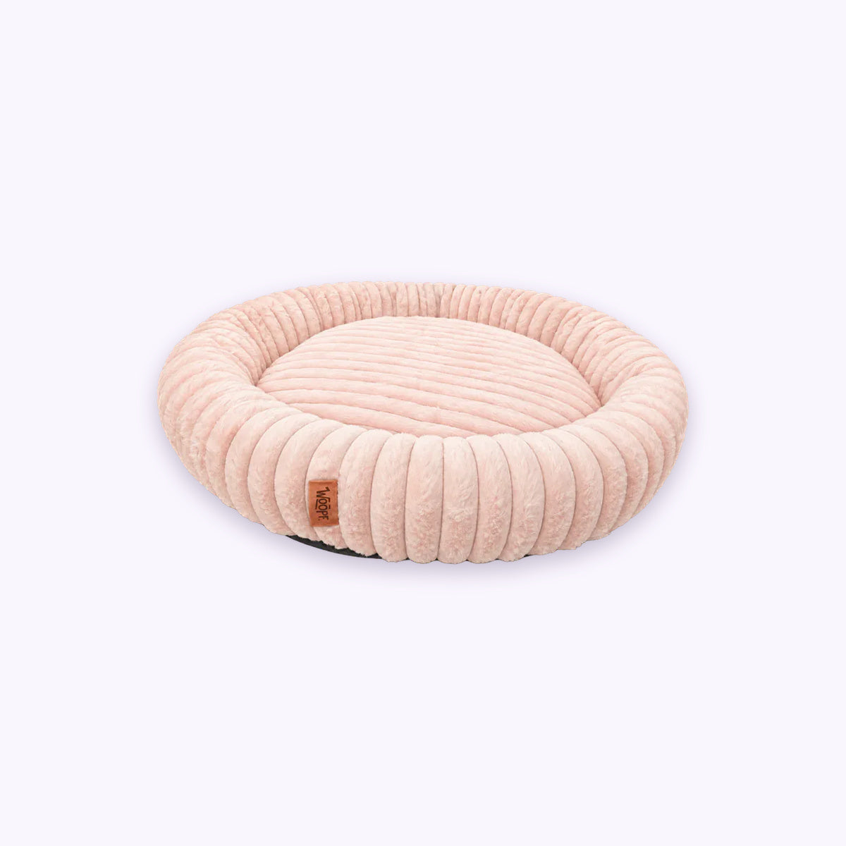 Pale pink | Furry Corduroy Round Bed: The Pale pink bed on its own on a pale lavender background