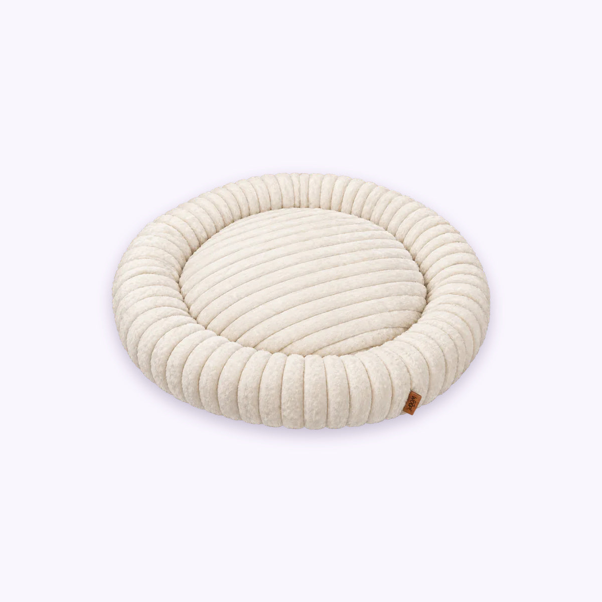 White | Furry Corduroy Round Bed: The White bed on its own on a pale lavender background