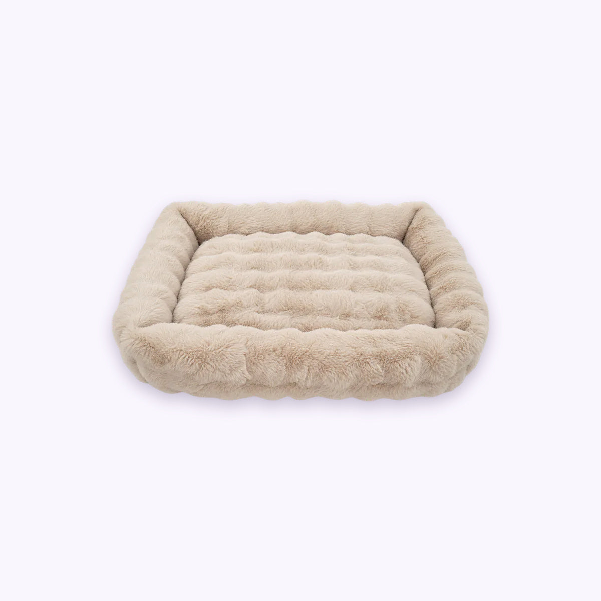 Cream | Furry Curves Rectangle Bed: The Cream bed on its own on a pale lavender background