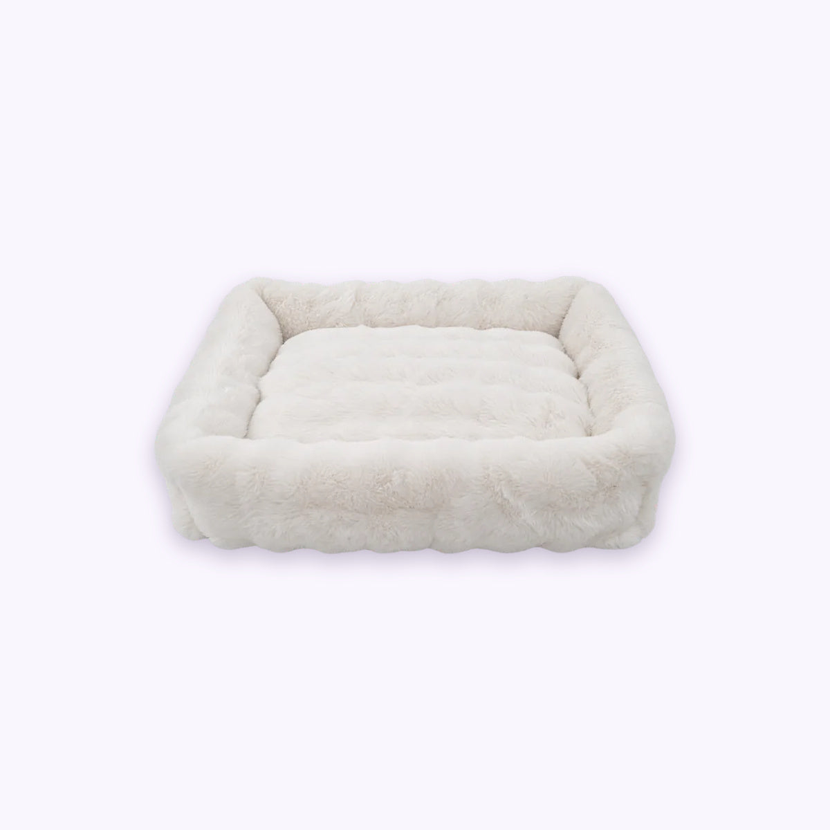 Furry Curves Rectangle Bed: The White bed on its own on a pale lavender background