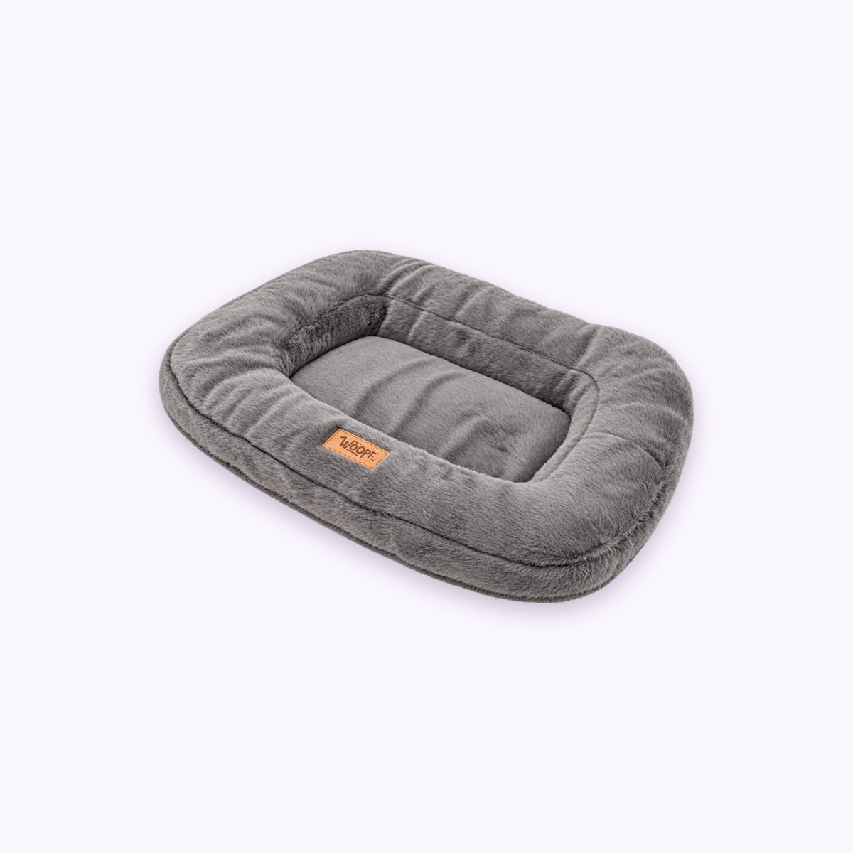 Grey | Furry Range Rectangle Bed: The Grey bed on its own on a pale lavender background