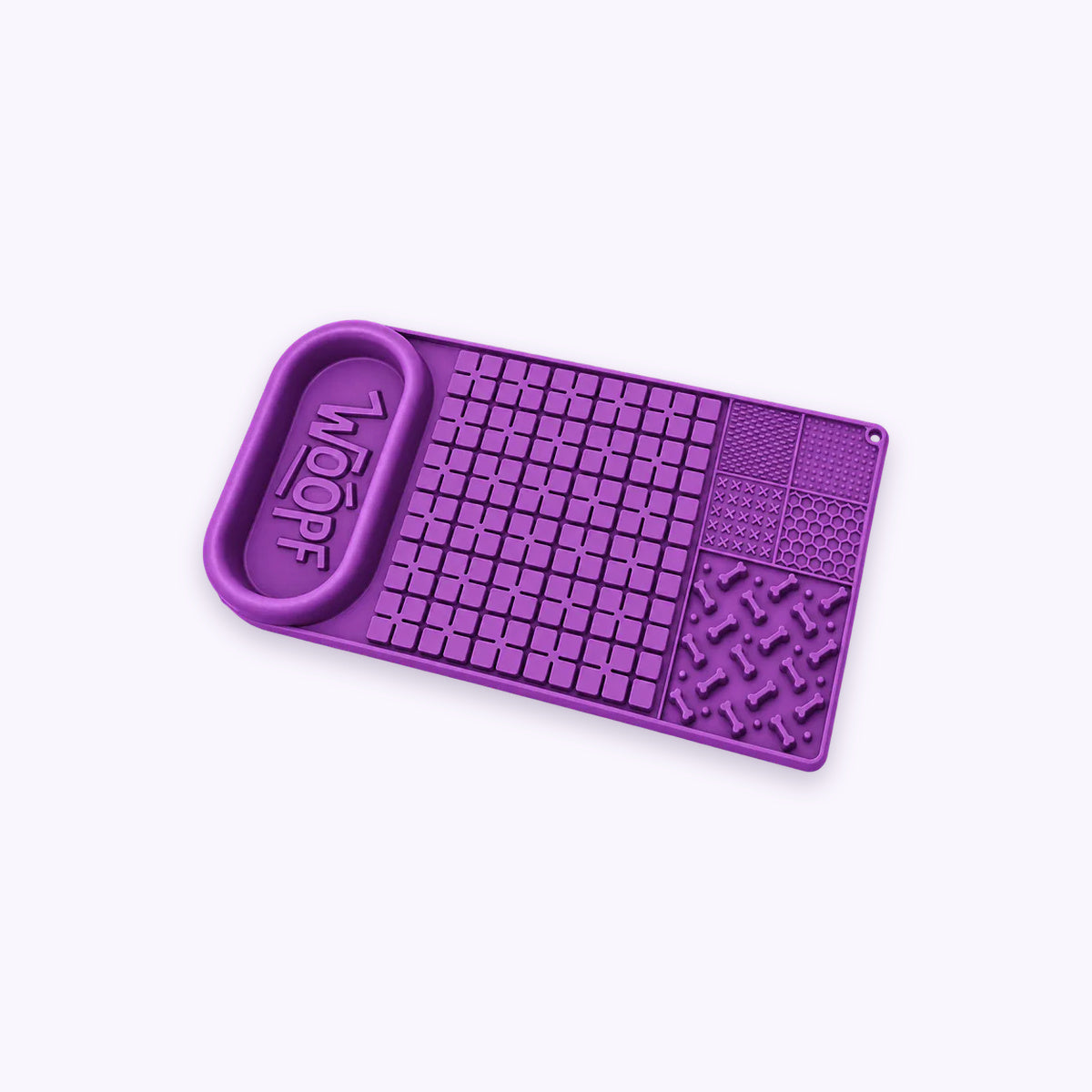 Purple | Licky Bowl Mat: The Purple mat on its own on a pale lavender background
