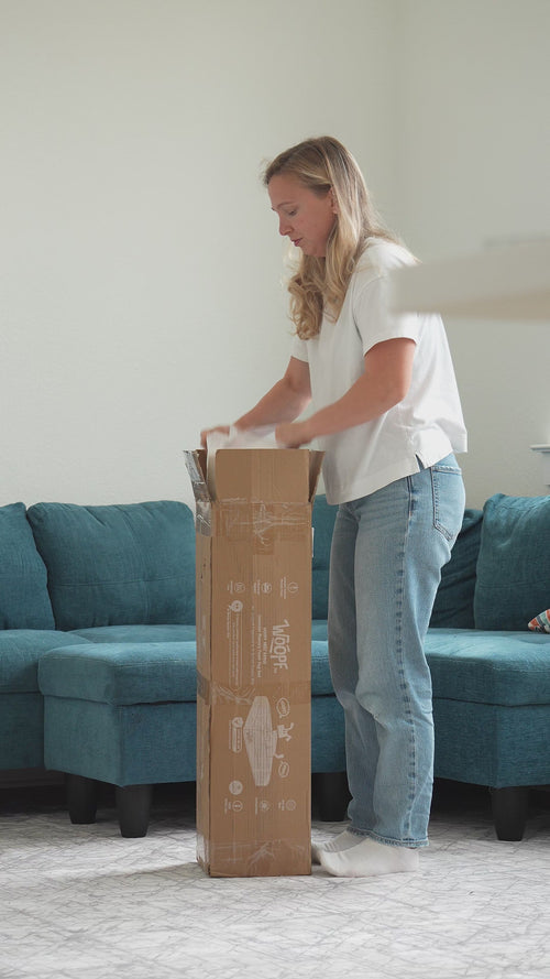 Cream | SNÜZ Orthopedic Bouclé Bed: Video of a woman unboxing the Cream bed, a dog climbing on and the cover unzipped to show the base