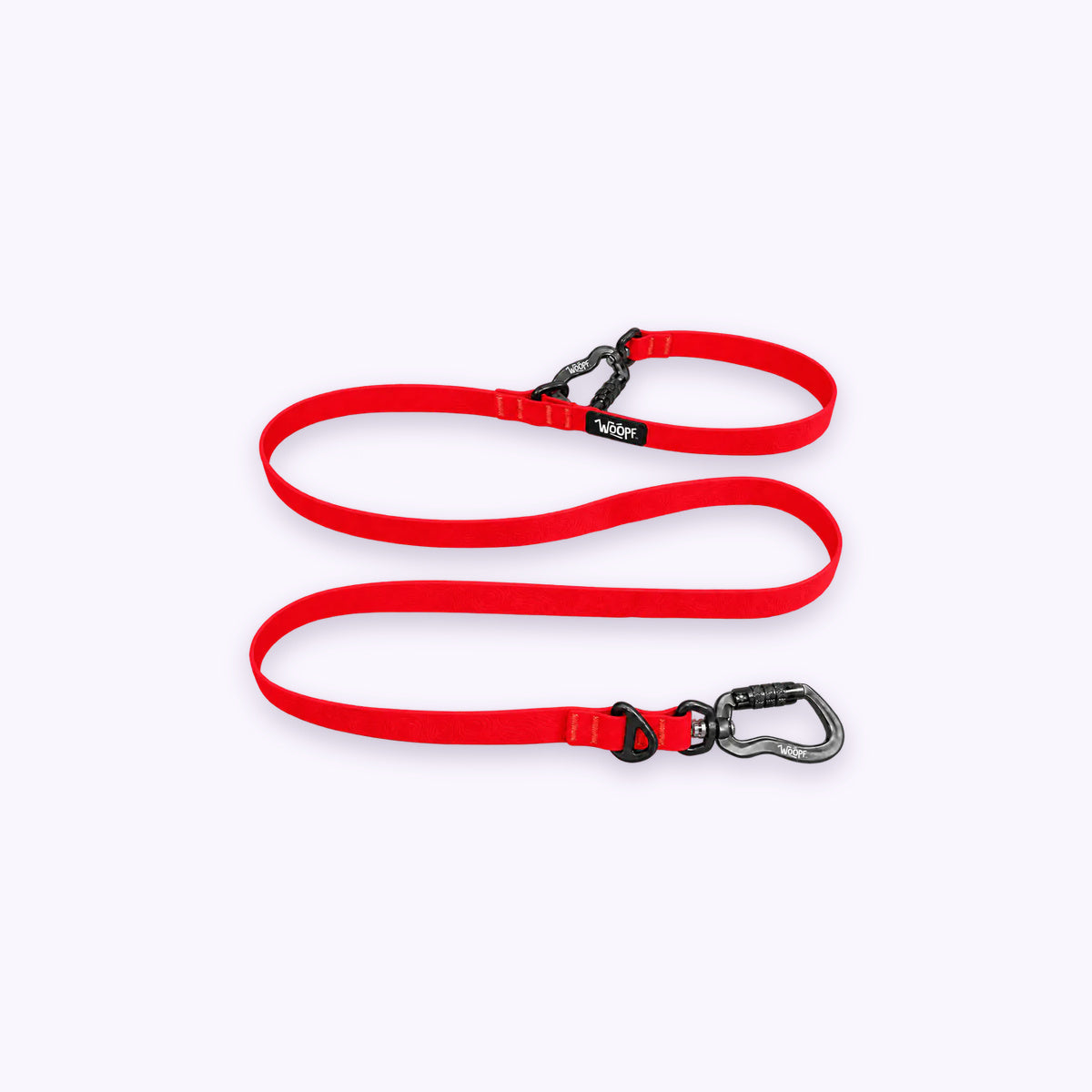 Sealskin Extendable Leash: The Red lead on its own on a pale lavender background, with both clips and both rings