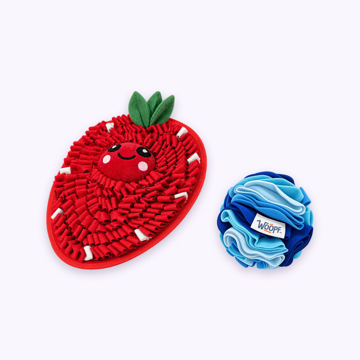 Strawberry | Sniff & Snuffle Bundle: The Strawberry Snuffle Mat with the Blue Snuffle Ball on a pale lavender background
