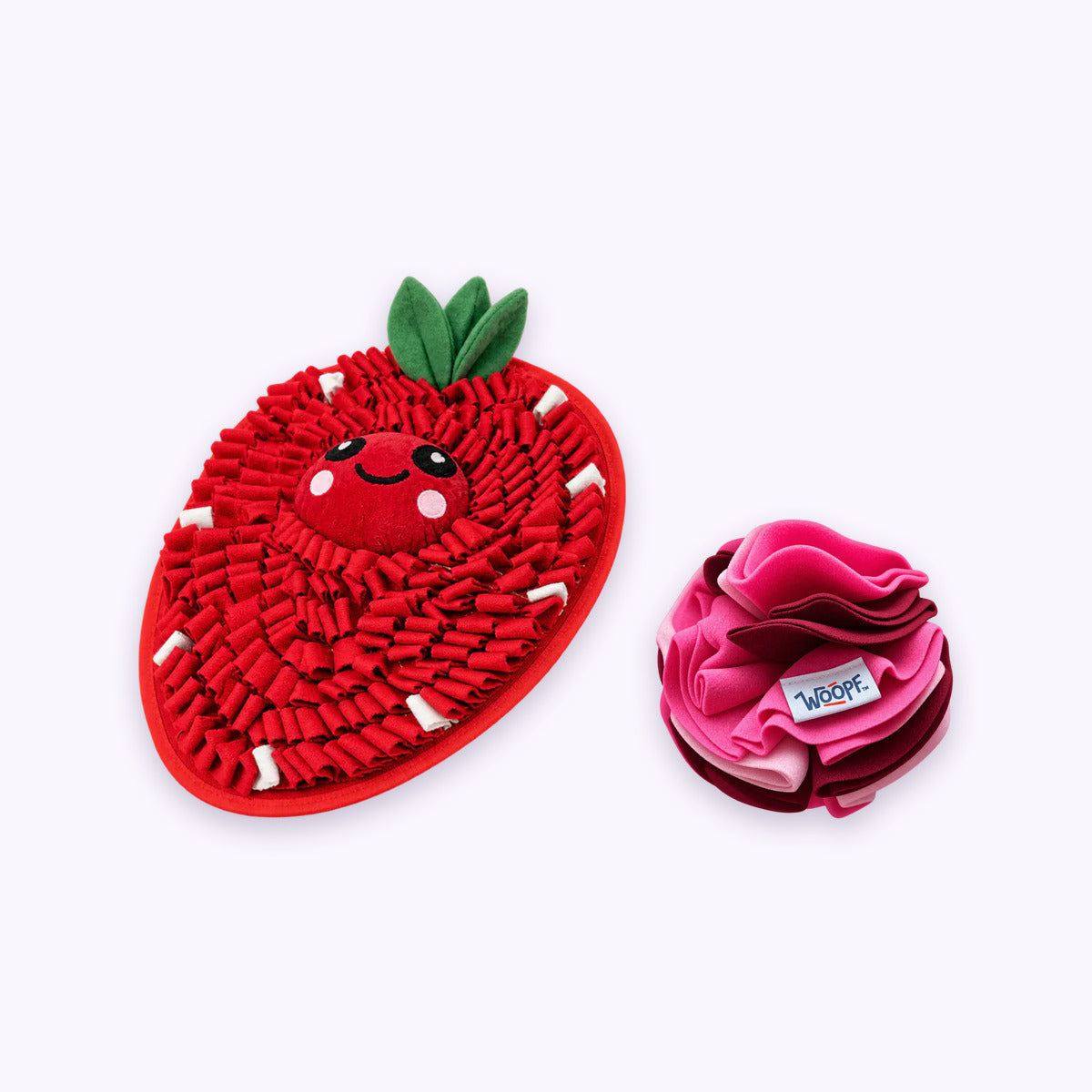 Strawberry | Sniff & Snuffle Bundle: The Strawberry Snuffle Mat with the Pink Snuffle Ball on a pale lavender background