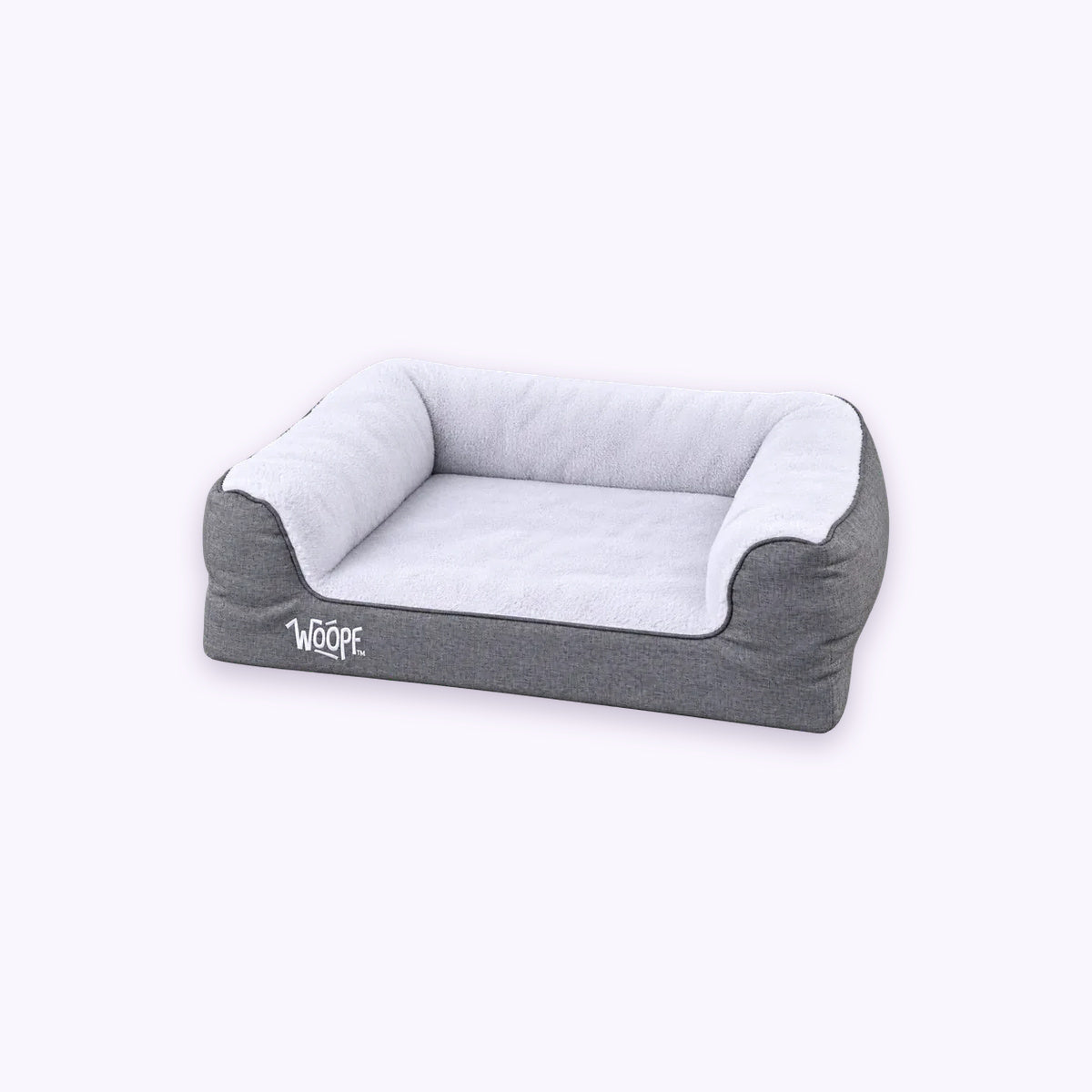SNÖR Orthopedic Bed: The Grey bed on its own on a pale lavender background