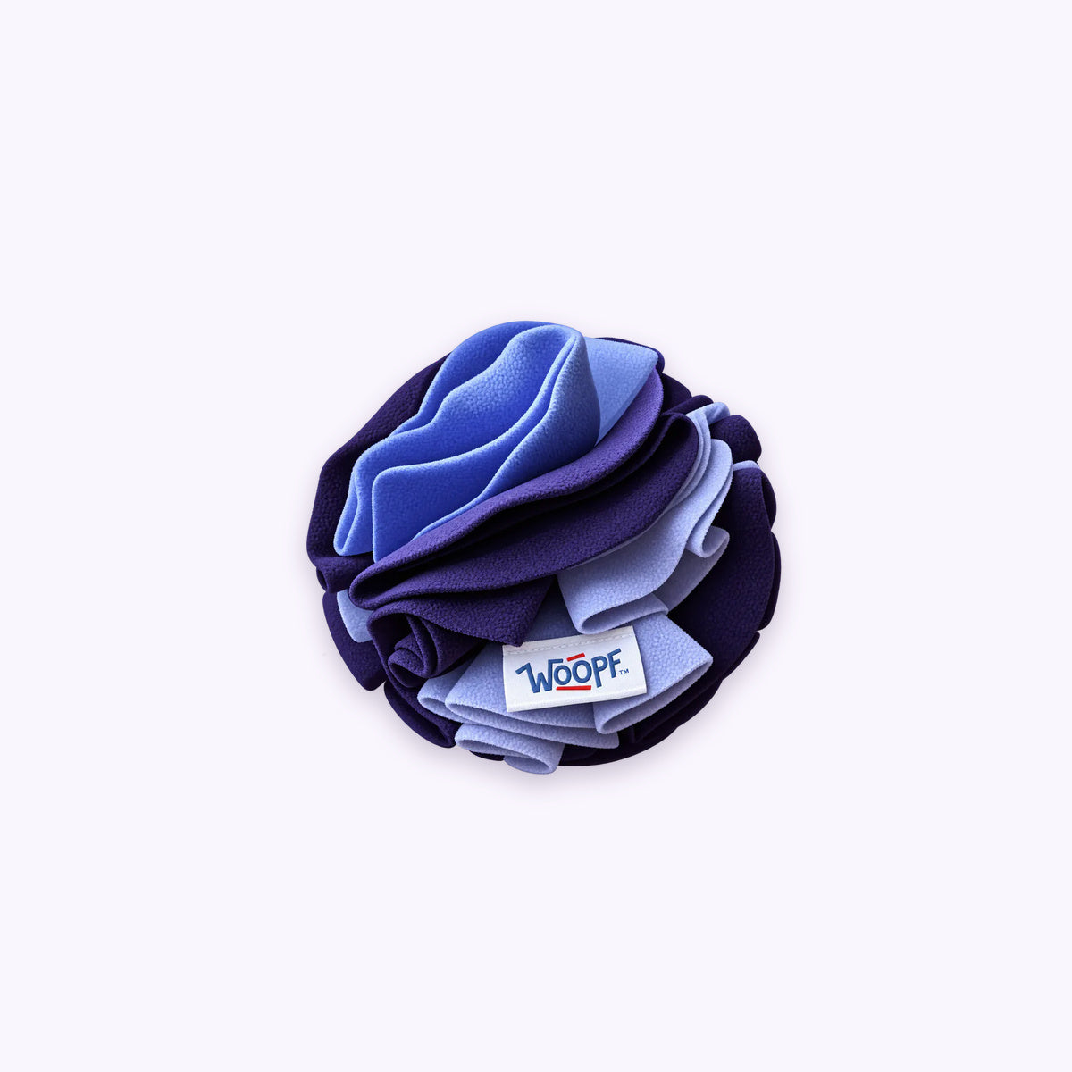 Purple | Snuffle Ball: The Purple ball on its own on a pale lavender background