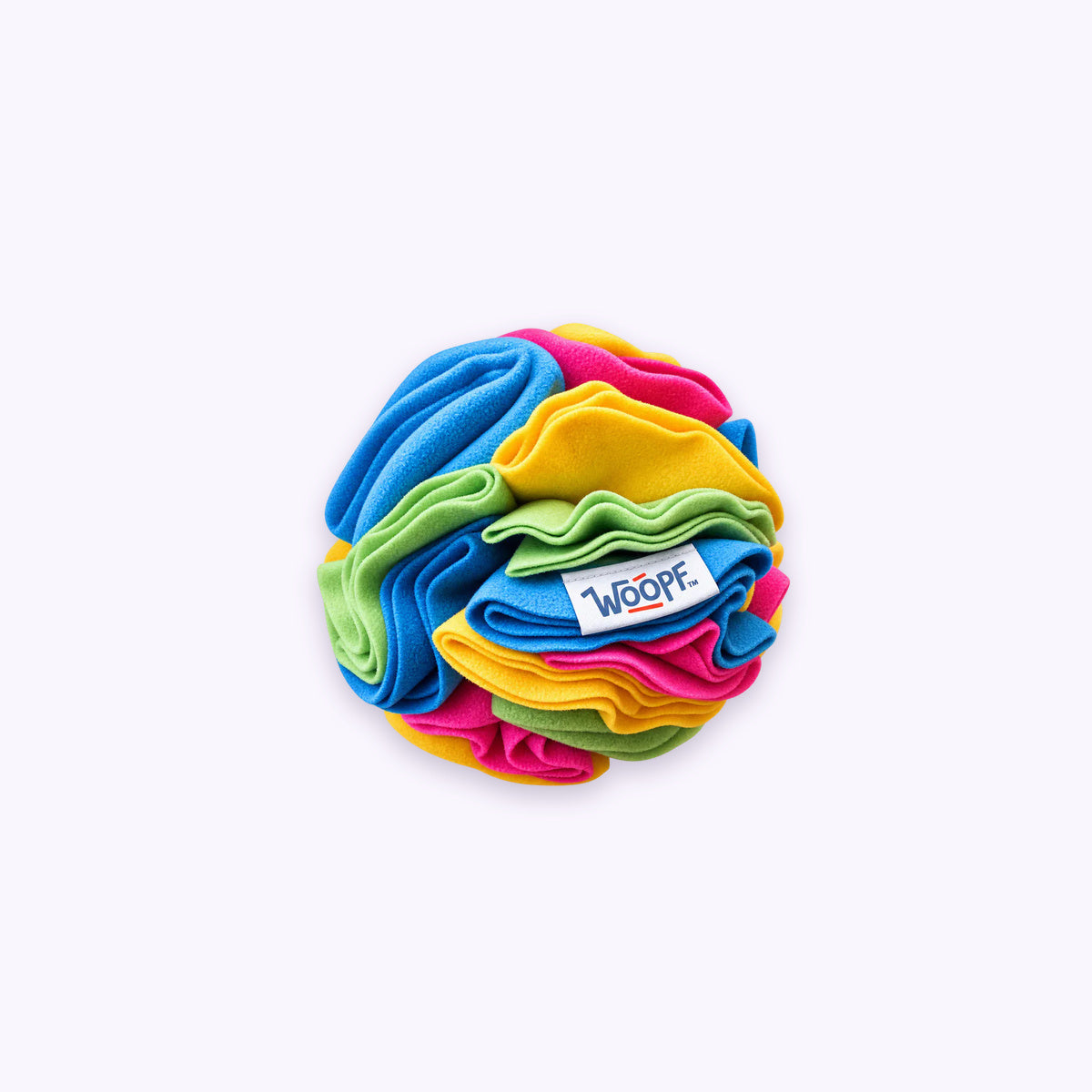 Snuffle Ball With Crackles: The Rainbow ball on its own on a pale lavender background
