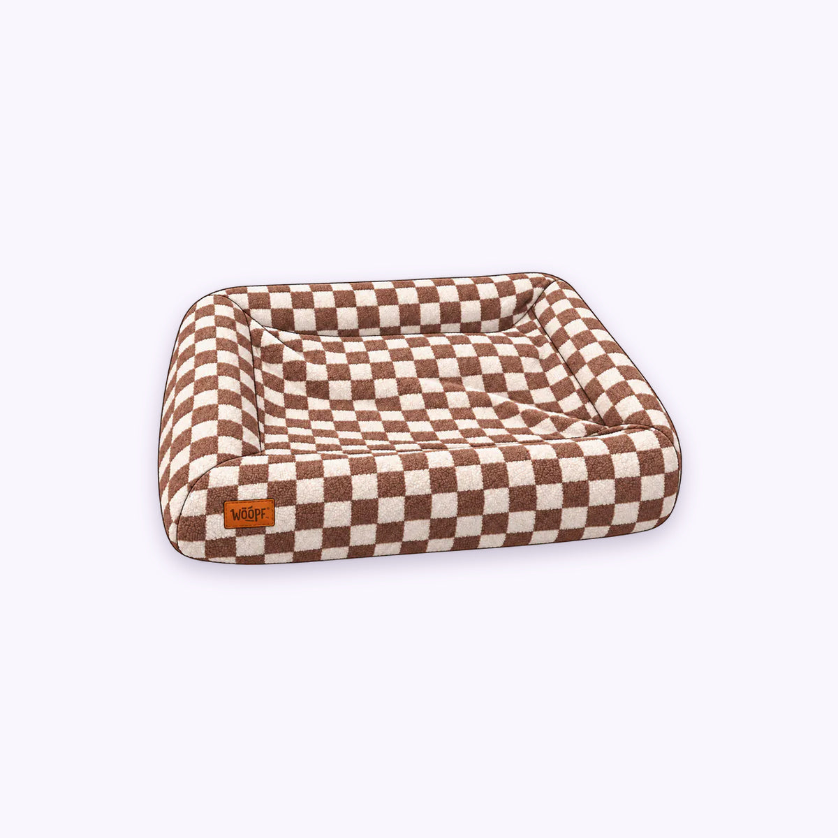 Brown | SNÜZ Bed Slip-On Cover Fleece: The Brown cover on the bed on its own on a pale lavender background