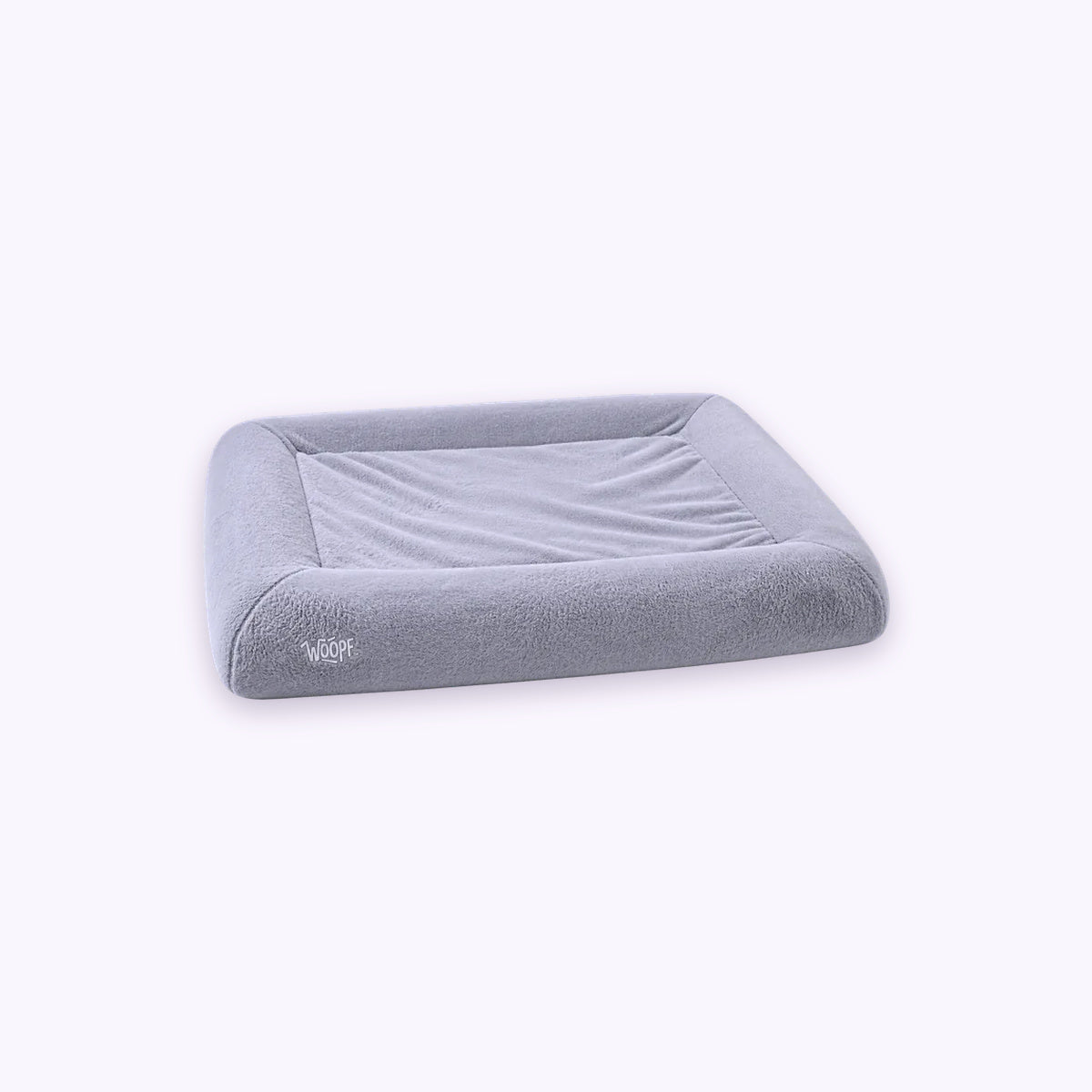 SNÜZ Bed Slip-On Cover (Faux Velvet Fur): The Grey cover on the bed on its own on a pale lavender background