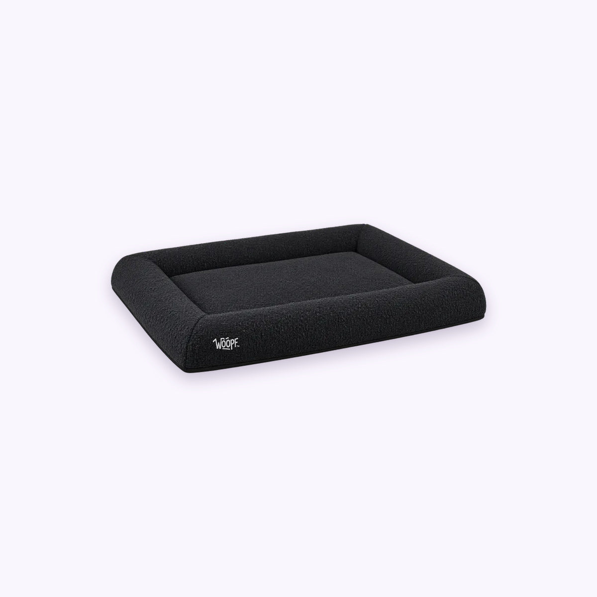 Black | SNÜZ Orthopedic Bouclé Bed: The Black bed on its own on a pale lavender background