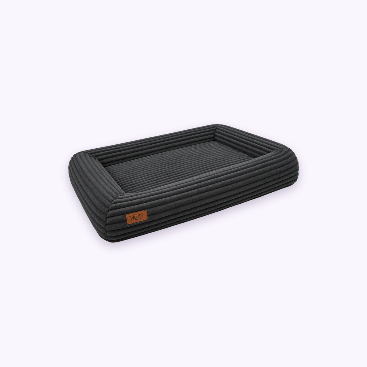 Black | SNÜZ Orthopedic Corduroy Bed: The Black bed on its own on a pale lavender background