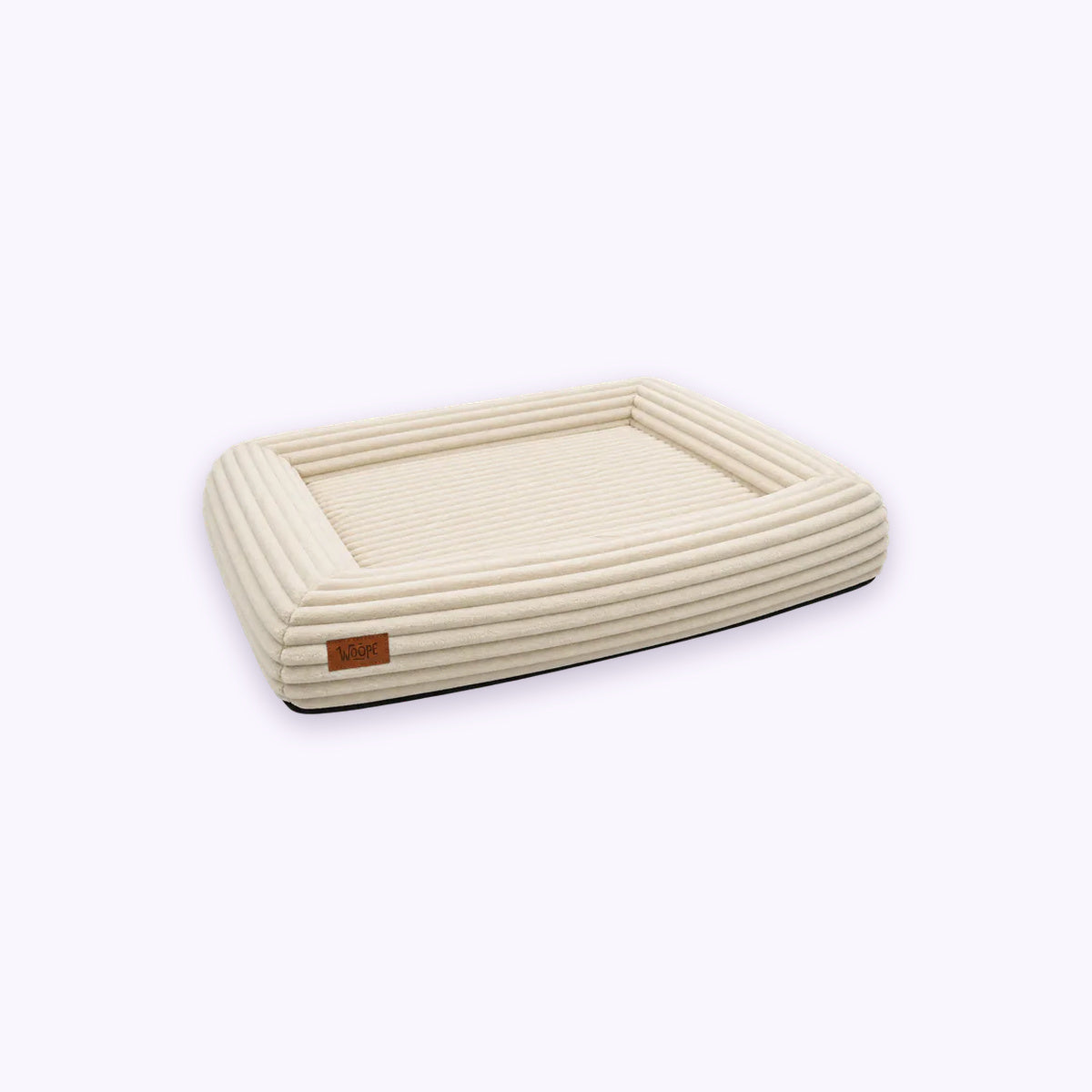 Cream | SNÜZ Orthopedic Corduroy Bed: The Cream bed on its own on a pale lavender background