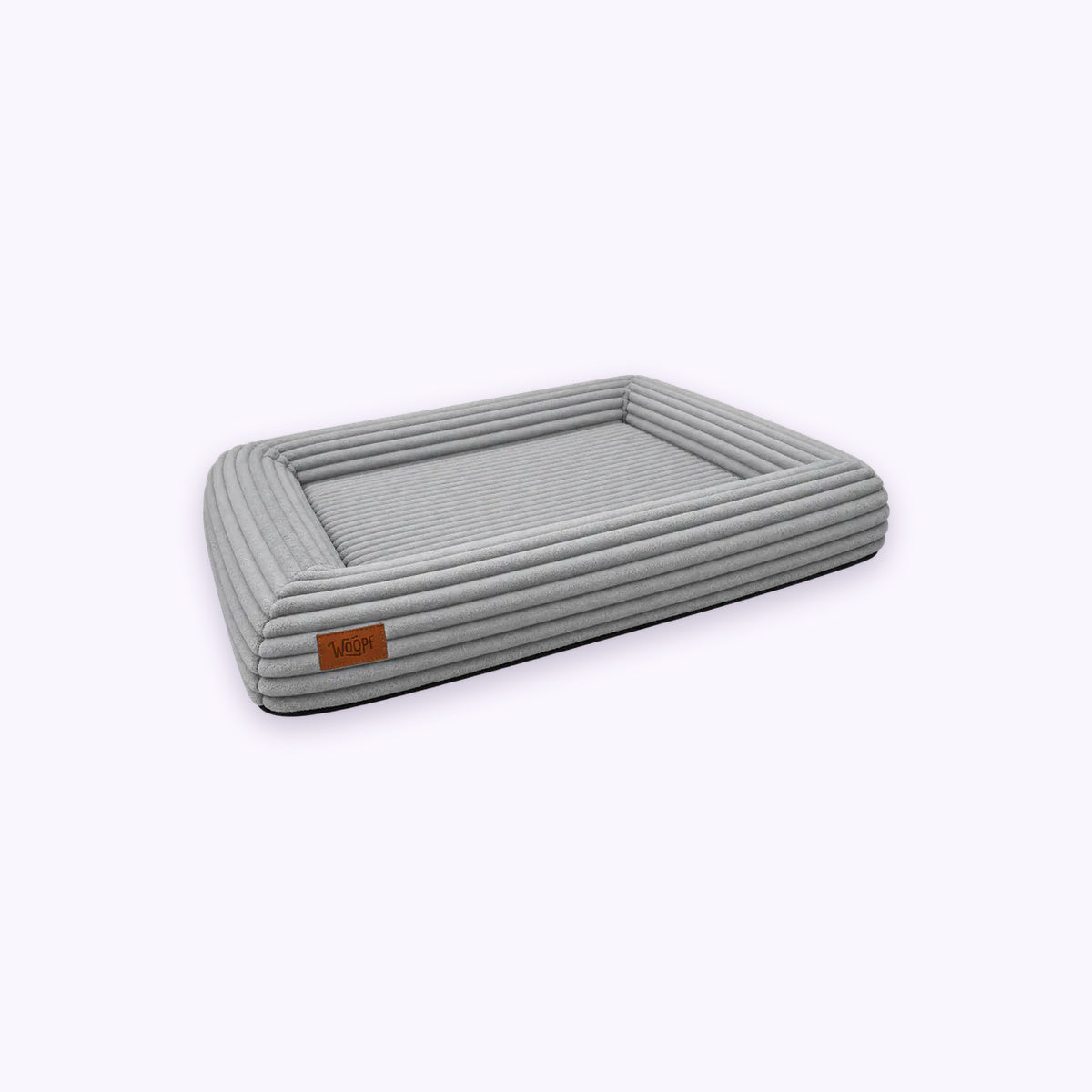 Grey | SNÜZ Orthopedic Corduroy Bed: The Grey bed on its own on a pale lavender background