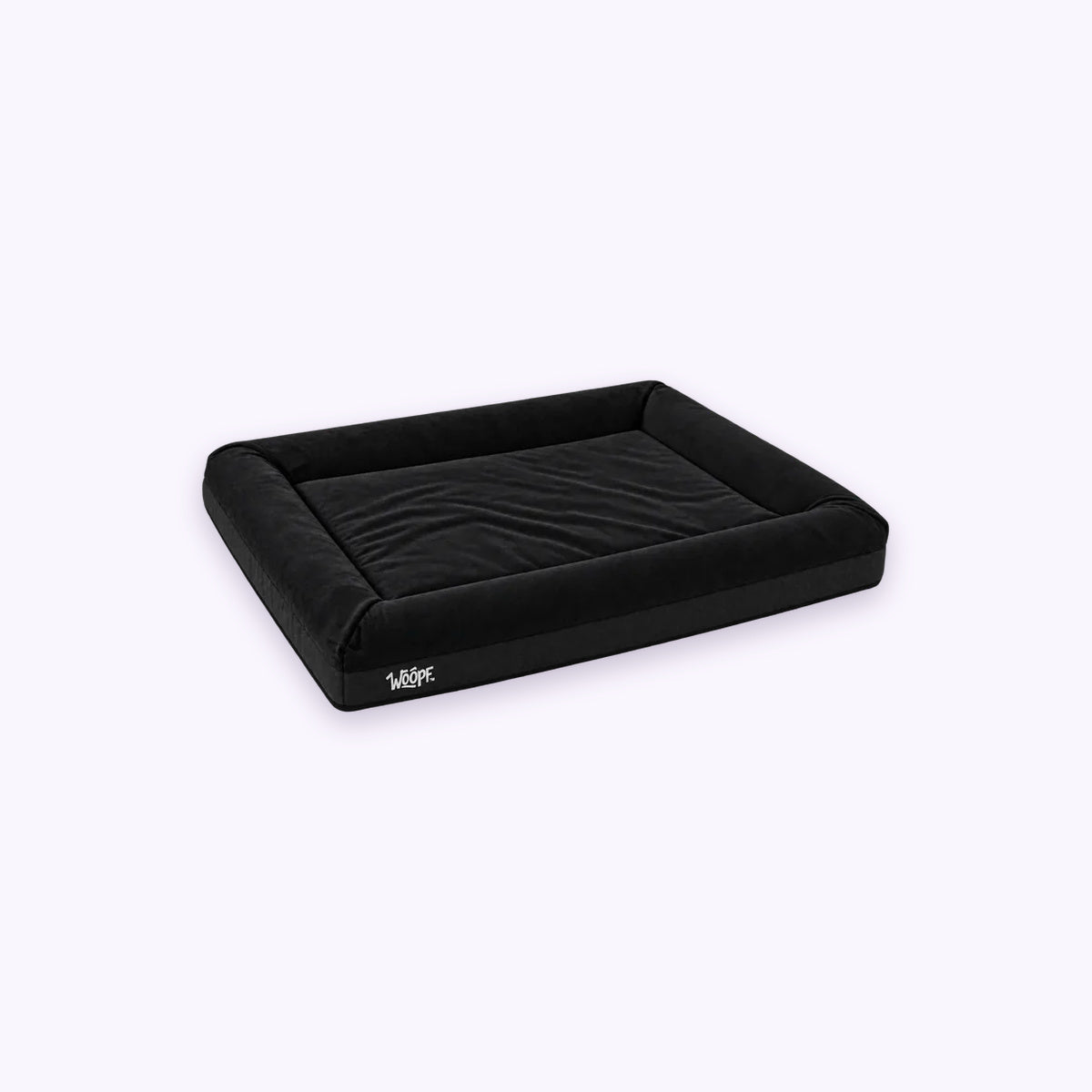 Black | SNÜZ Orthopedic Suede Bed: The Black bed on its own on a pale lavender background