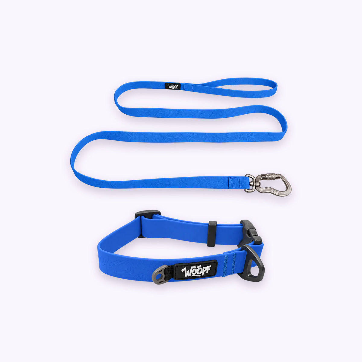Blue | Swimmer Bundle: The Blue Sealskin Waterproof Dog Collar with the Blue Sealskin Lightweight Waterproof Leash on a pale lavender background