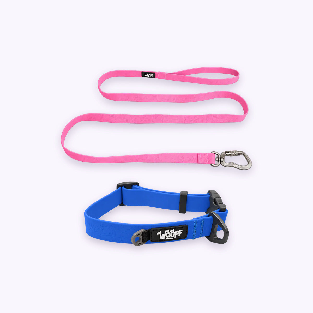 Blue | Swimmer Bundle: The Blue Sealskin Waterproof Dog Collar with the Pink Sealskin Lightweight Waterproof Leash on a pale lavender background