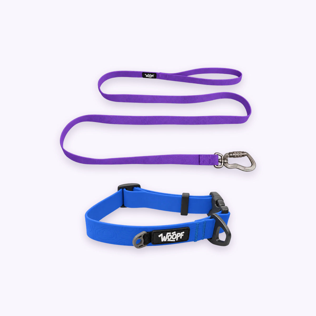 Blue | Swimmer Bundle: The Blue Sealskin Waterproof Dog Collar with the Purple Sealskin Lightweight Waterproof Leash on a pale lavender background