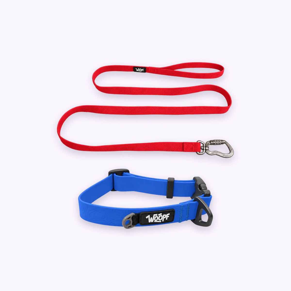 Blue | Swimmer Bundle: The Blue Sealskin Waterproof Dog Collar with the Red Sealskin Lightweight Waterproof Leash on a pale lavender background