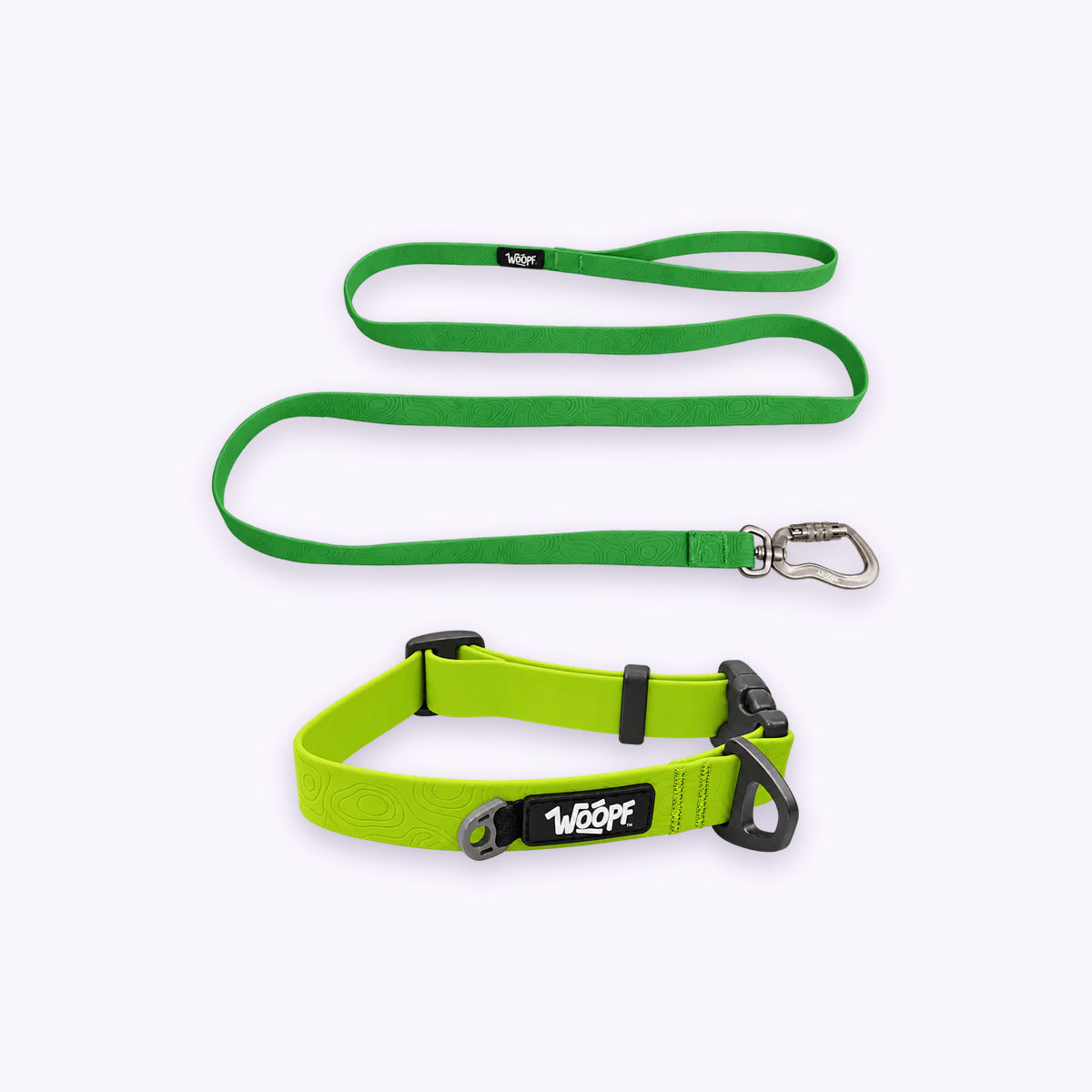 Green | Swimmer Bundle: The Green Sealskin Waterproof Dog Collar with the Green Sealskin Lightweight Waterproof Leash on a pale lavender background