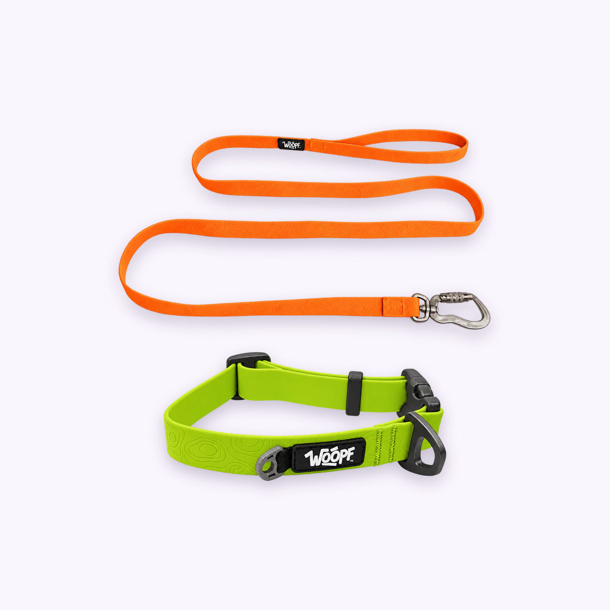 Green | Swimmer Bundle: The Green Sealskin Waterproof Dog Collar with the Orange Sealskin Lightweight Waterproof Leash on a pale lavender background