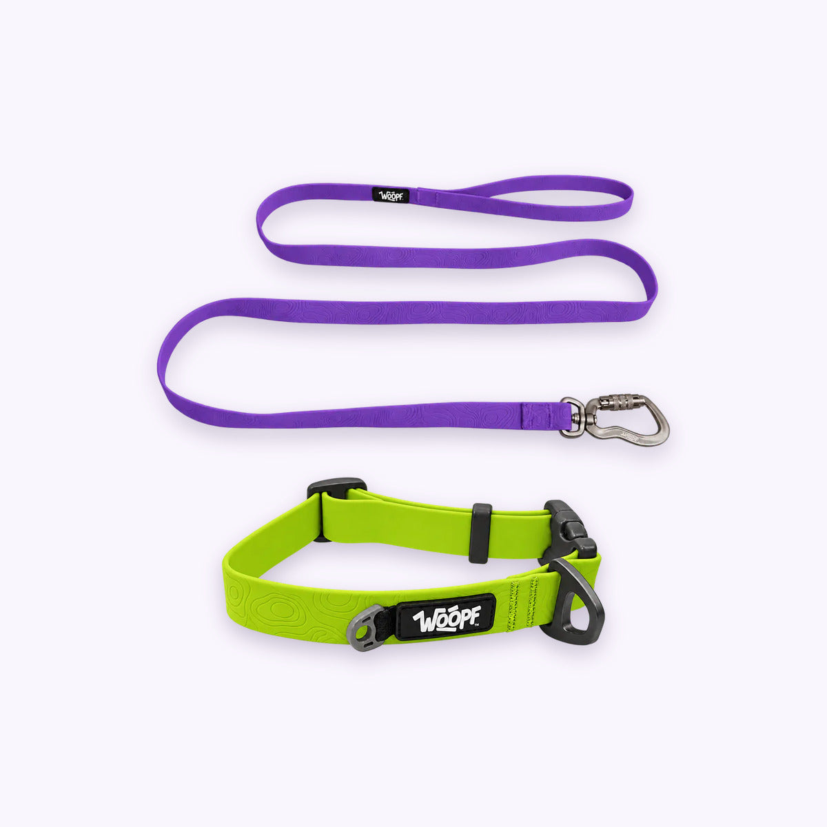 Green | Swimmer Bundle: The Green Sealskin Waterproof Dog Collar with the Purple Sealskin Lightweight Waterproof Leash on a pale lavender background