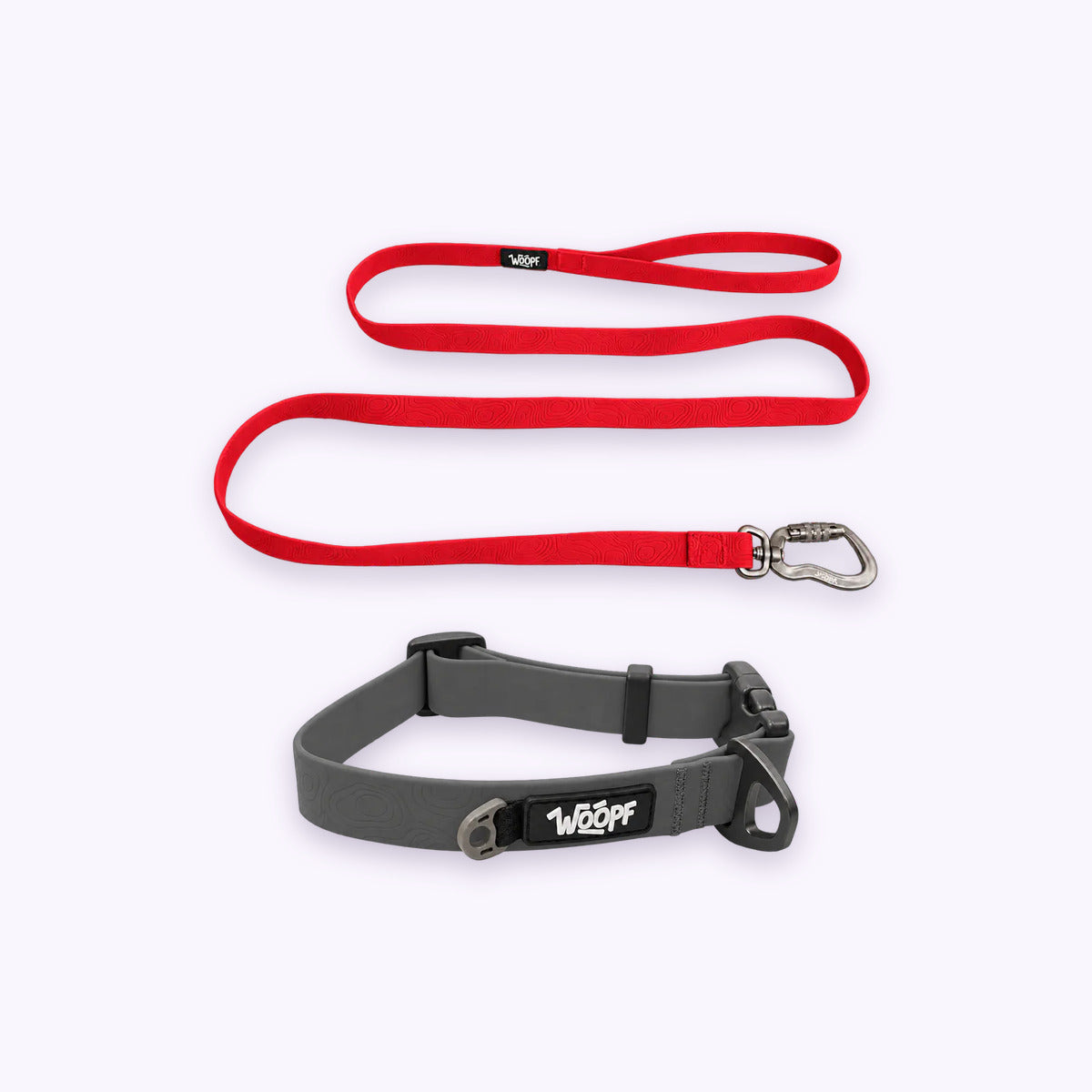 Grey | Swimmer Bundle: The Grey Sealskin Waterproof Dog Collar with the Red Sealskin Lightweight Waterproof Leash on a pale lavender background